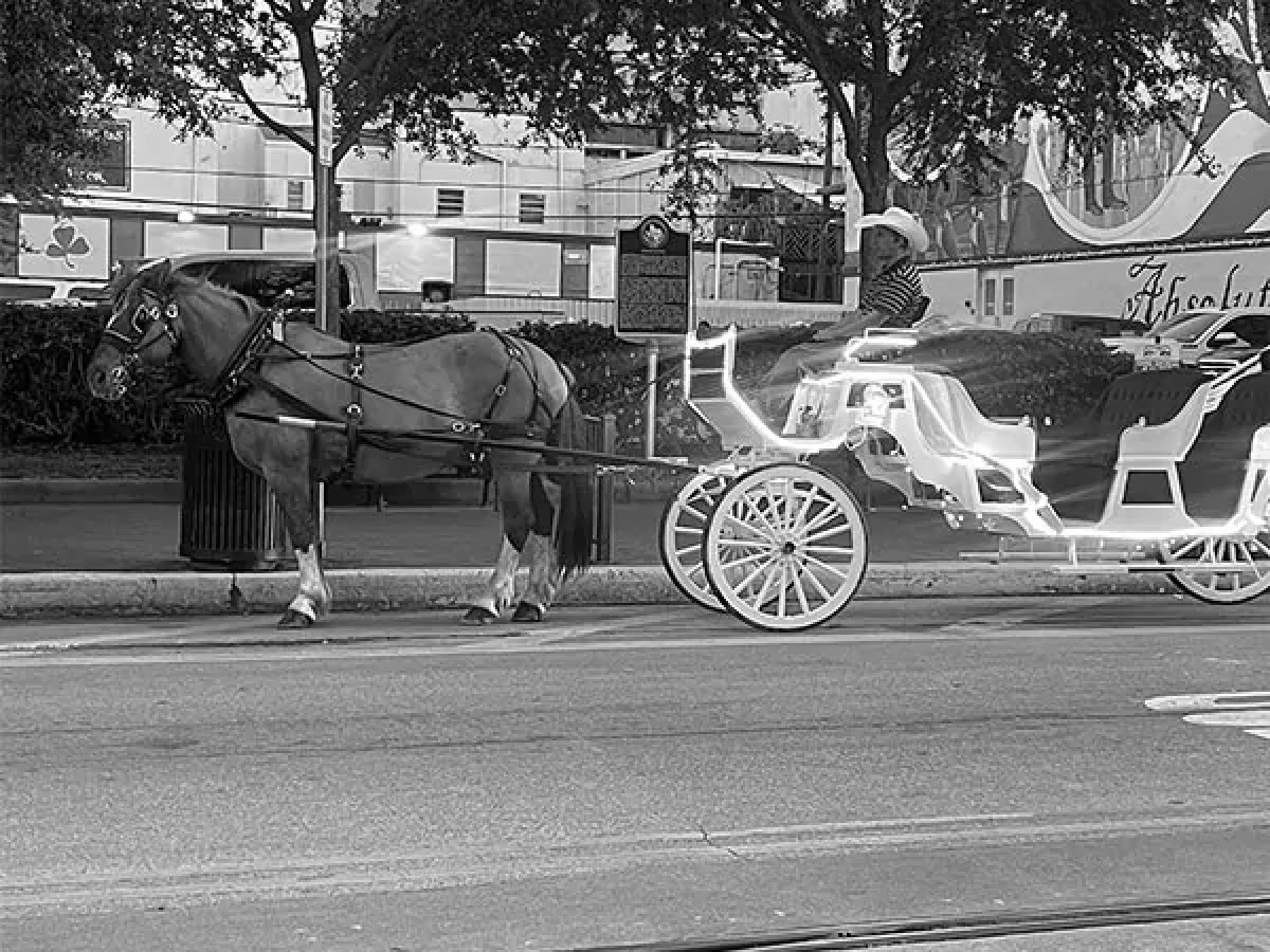 a person riding a motorcycle on a city street